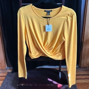 Brand new yellow shirt.